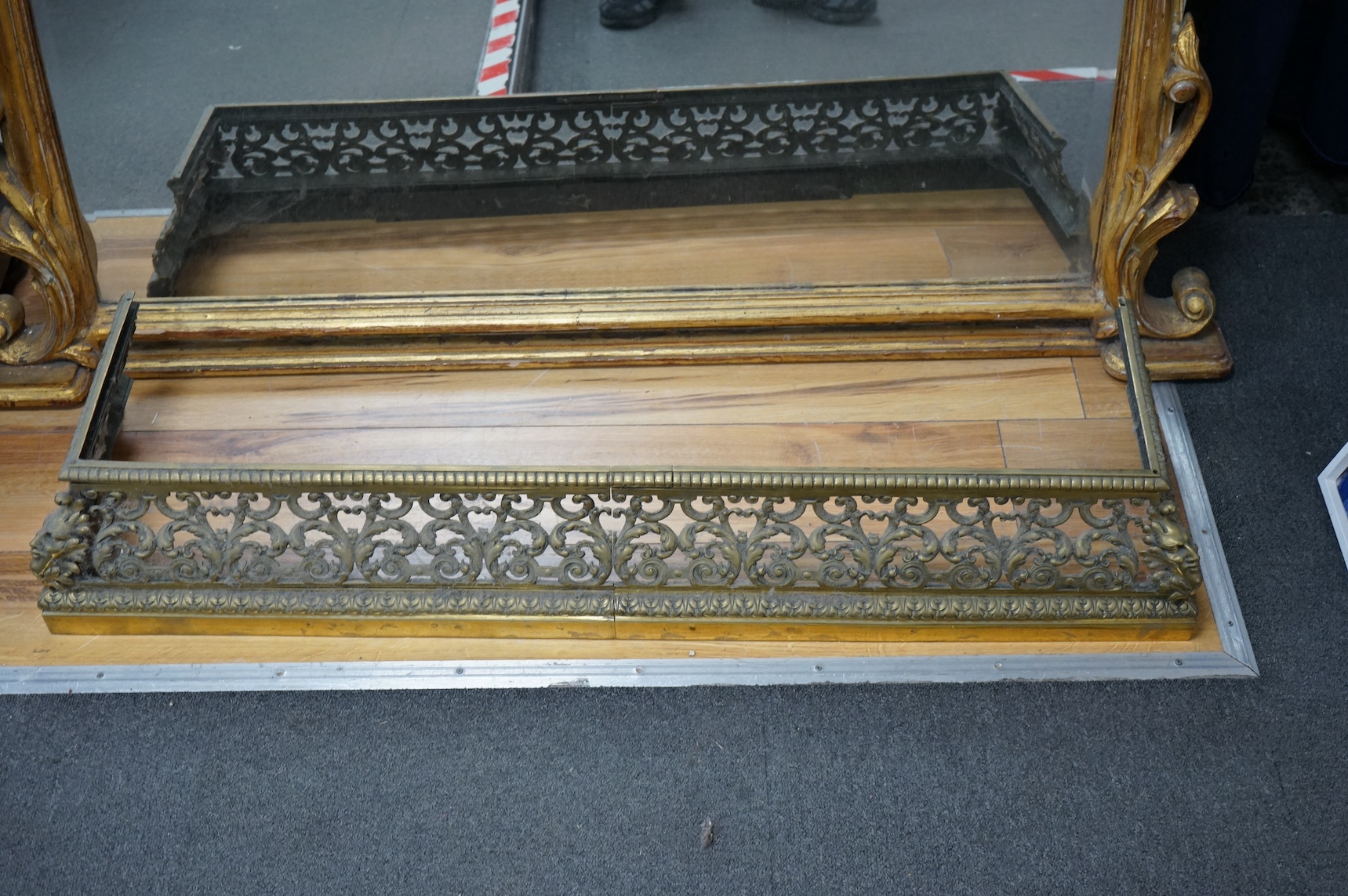 A 19th century cast bronze fender, signed Hollenbach, Wien, 98cm x 27cm deep